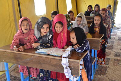 A year after the Herat earthquakes, the Afghanistan Humanitarian Fund and Central Emergency Response Fund support has helped students get back to learning with tents and educational kits in Afghanistan's Herat Province. Photo: UNA-UK/Abdullah Zahid.